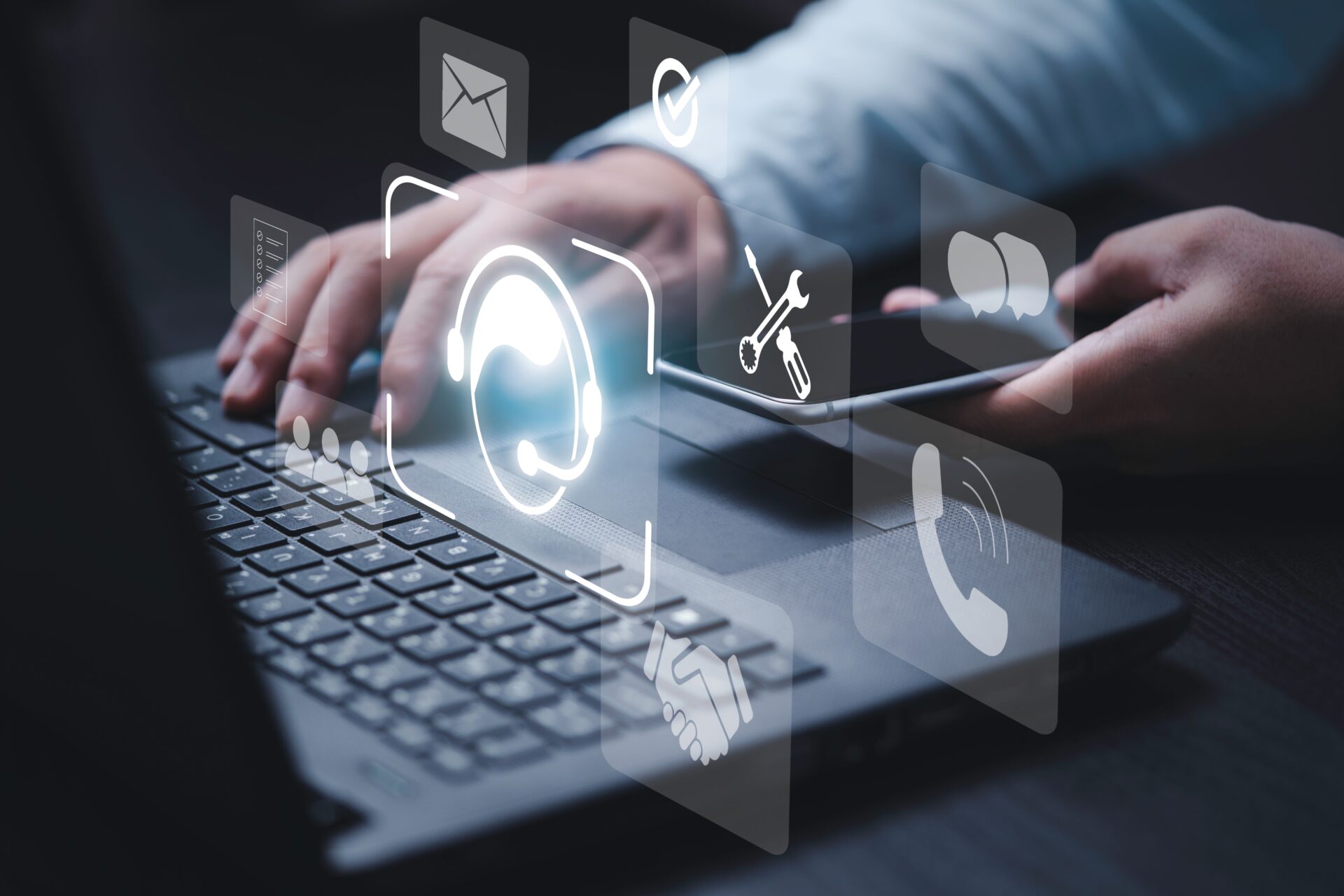 IT Service desk - man operating a laptop