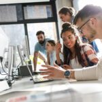 Group of team workers and programmers starting a new project