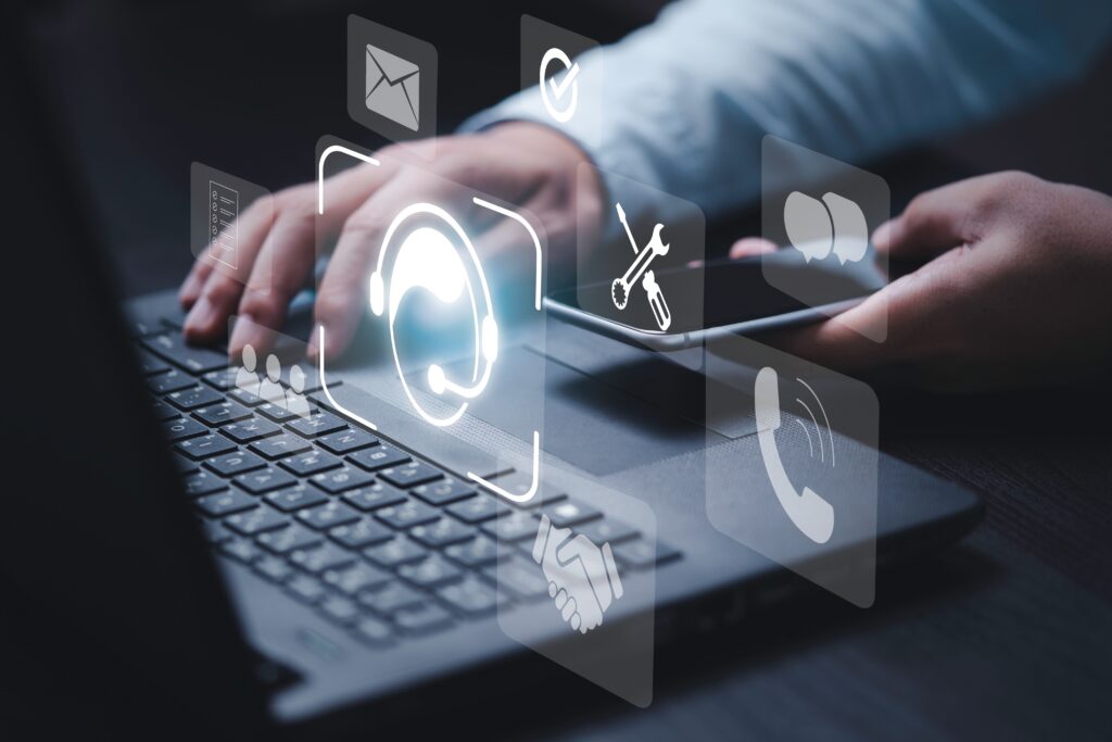 business man on a laptop - Fully Managed IT Reduces Risk